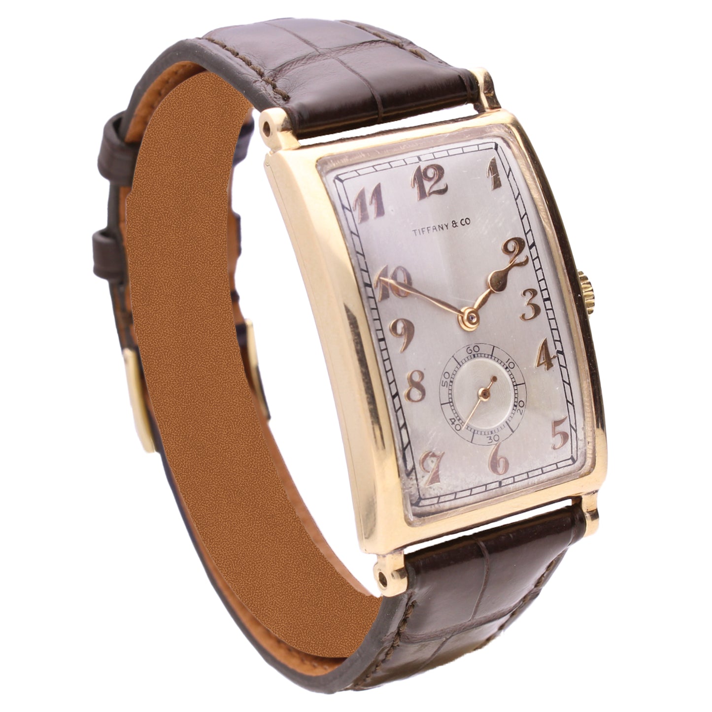 18ct yellow gold Patek Philippe, ref. 431 rectangular curved wristwatch, retailed by TIFFANY. Made 1940