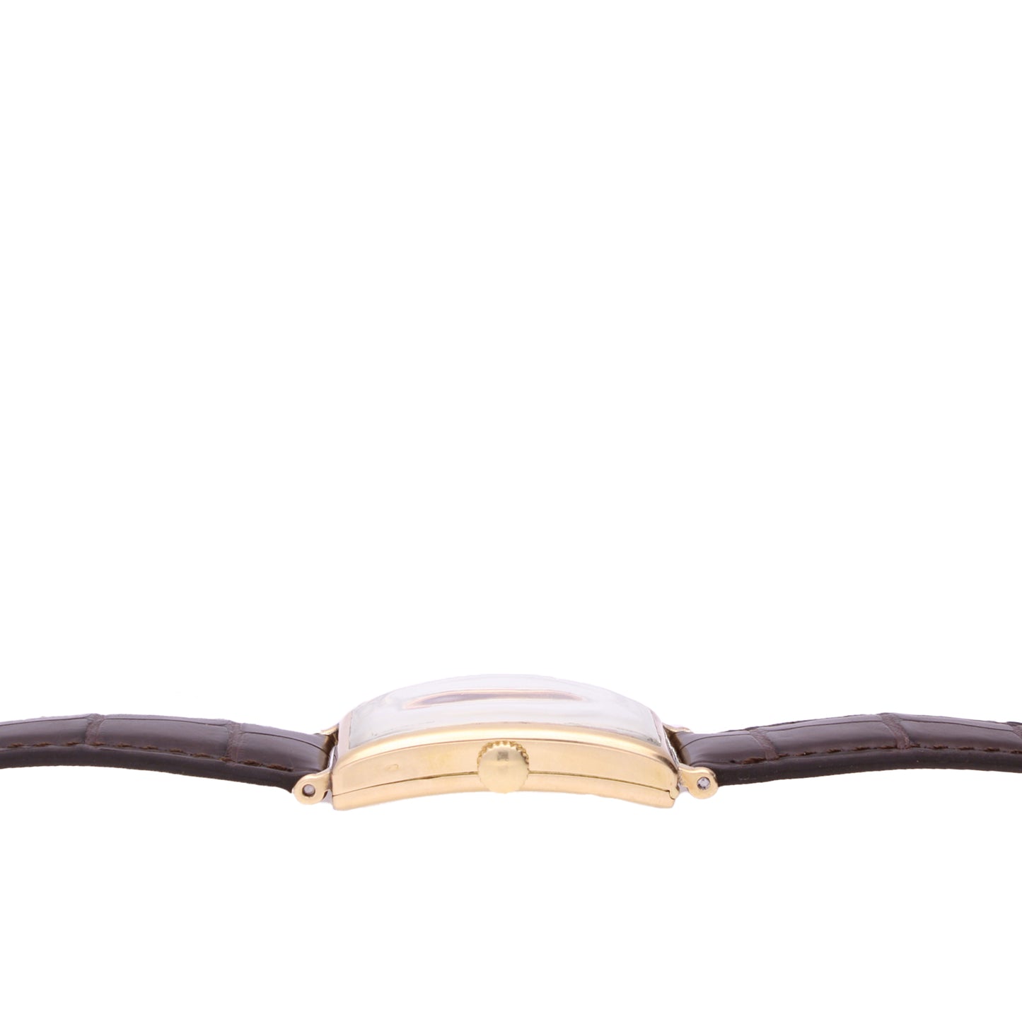 18ct yellow gold Patek Philippe, ref. 431 rectangular curved wristwatch, retailed by TIFFANY. Made 1940