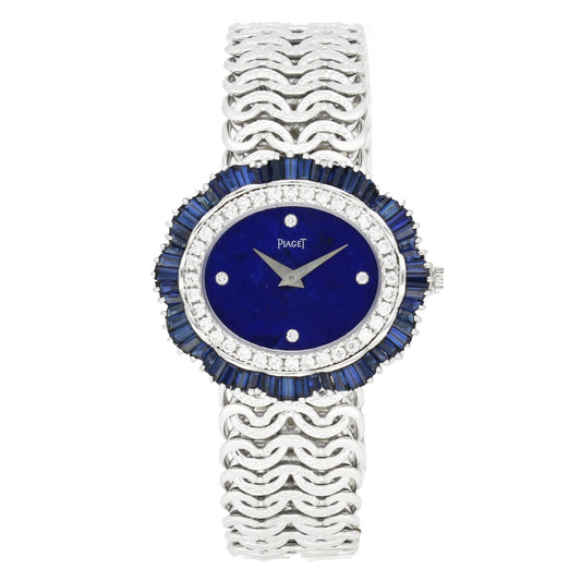 18ct white gold Piaget ref. 9317 'oval cased' with lapis lazuli dial and diamond and sapphire set bezel bracelet watch. Made 1970's