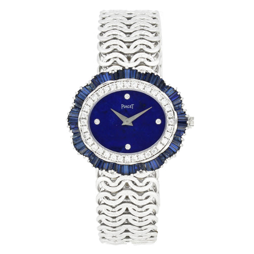 18ct white gold Piaget ref. 9317 'oval cased' with lapis lazuli dial and diamond and sapphire set bezel bracelet watch. Made 1970's