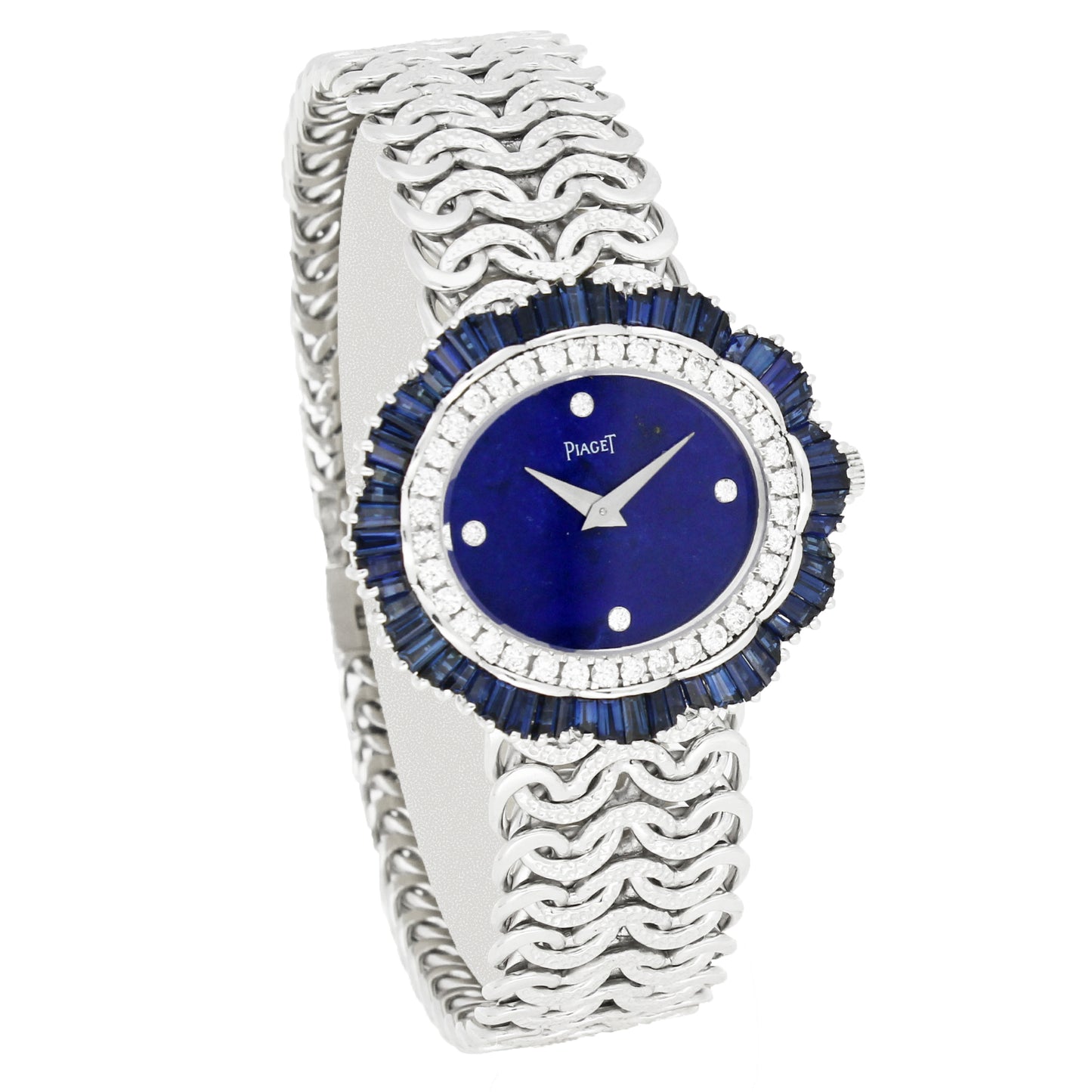 18ct white gold Piaget ref. 9317 'oval cased' with lapis lazuli dial and diamond and sapphire set bezel bracelet watch. Made 1970's