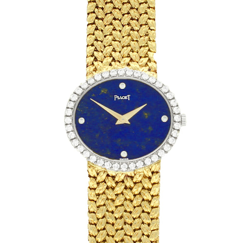 18ct yellow gold Piaget ref. 9806 'oval cased' bracelet watch with lapis lazuli dial and diamond set bezel. Made 1970s