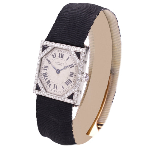 Platinum Cartier onyx and diamond wristwatch. Made 1920