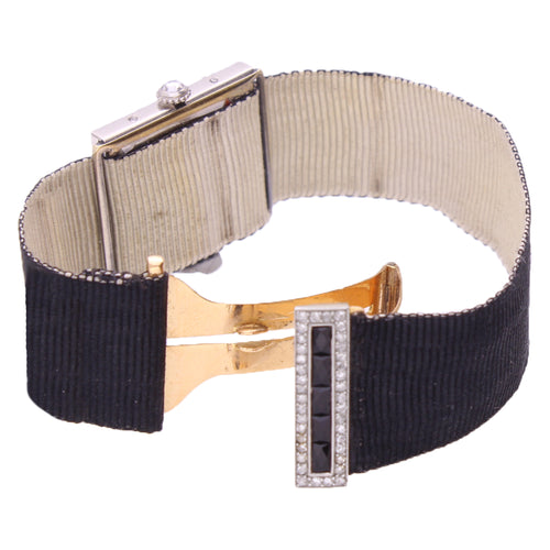 Platinum Cartier onyx and diamond wristwatch. Made 1920