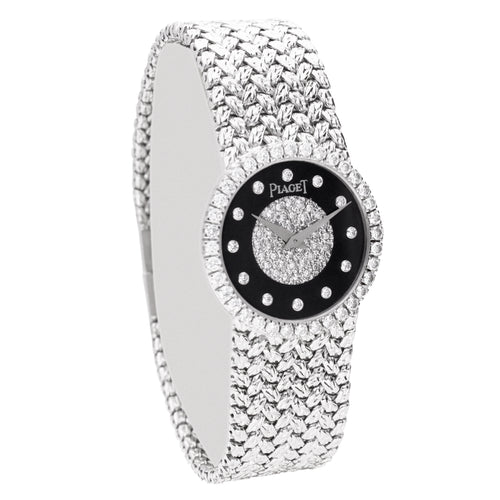 18ct white gold Piaget bracelet watch with onyx & diamond set dial. Made 1970