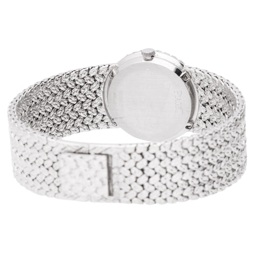 18ct white gold Piaget bracelet watch with onyx & diamond set dial. Made 1970