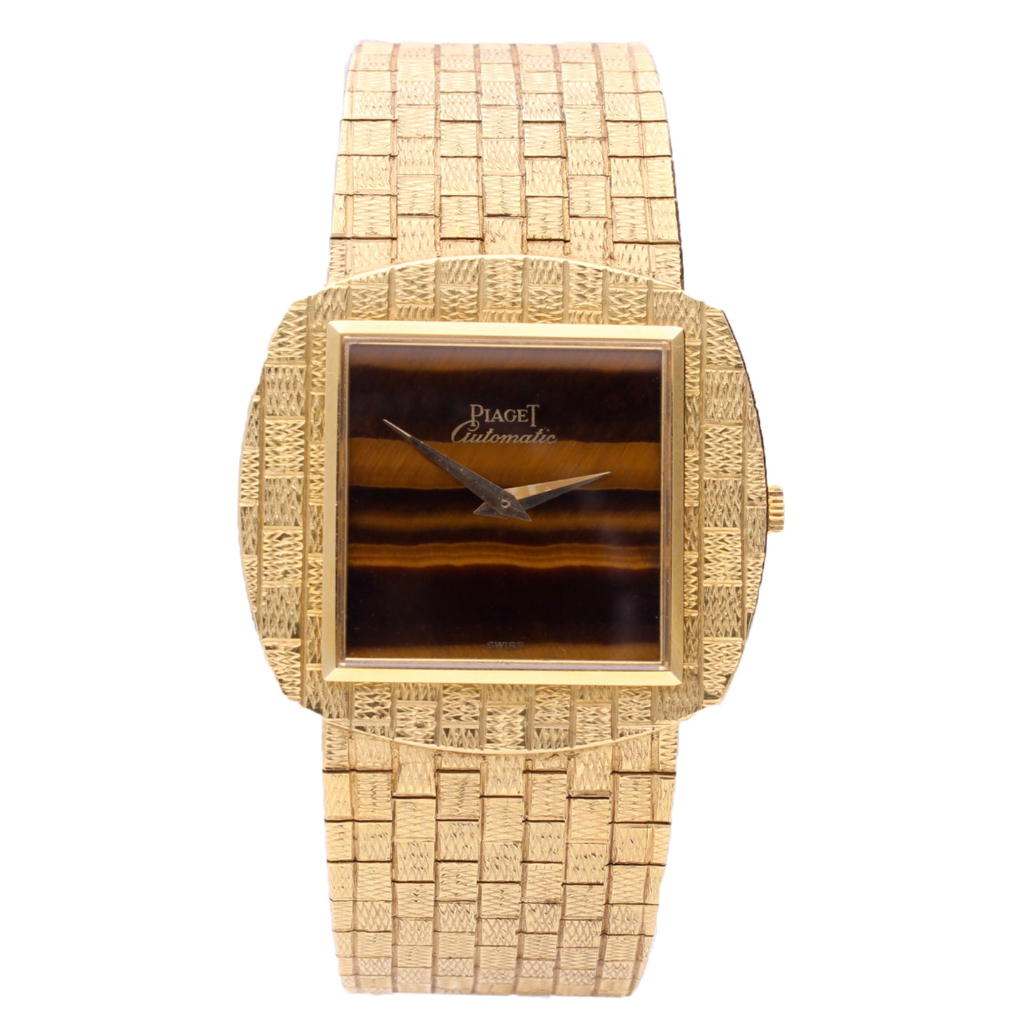 18ct yellow gold Piaget ref. 12461 automatic bracelet watch with tigers eye dial. Made 1971