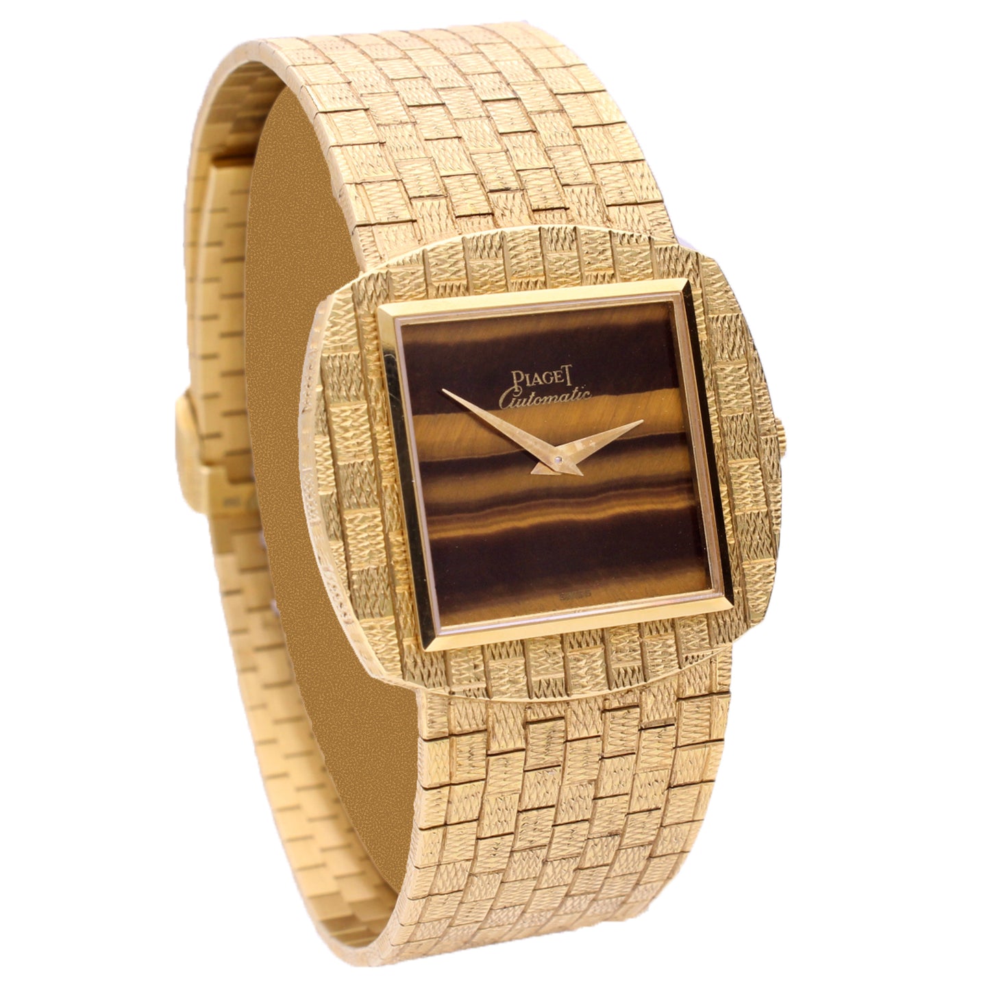 18ct yellow gold Piaget ref. 12461 automatic bracelet watch with tigers eye dial. Made 1971