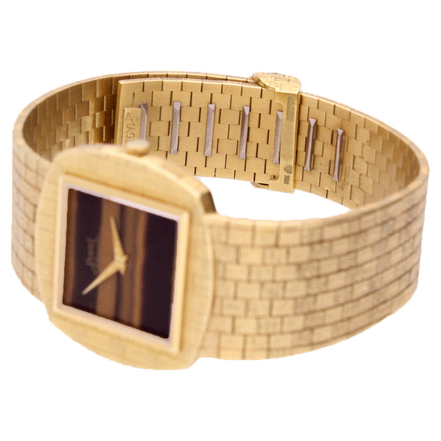 18ct yellow gold Piaget ref. 12461 automatic bracelet watch with tigers eye dial. Made 1971