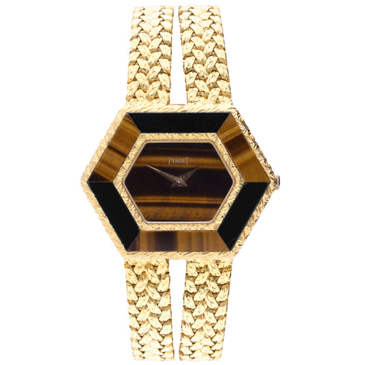 18ct yellow gold Piaget ref. 9253 'hexagonal case' bracelet watch with tigers eye dial and bezel. Made 1976