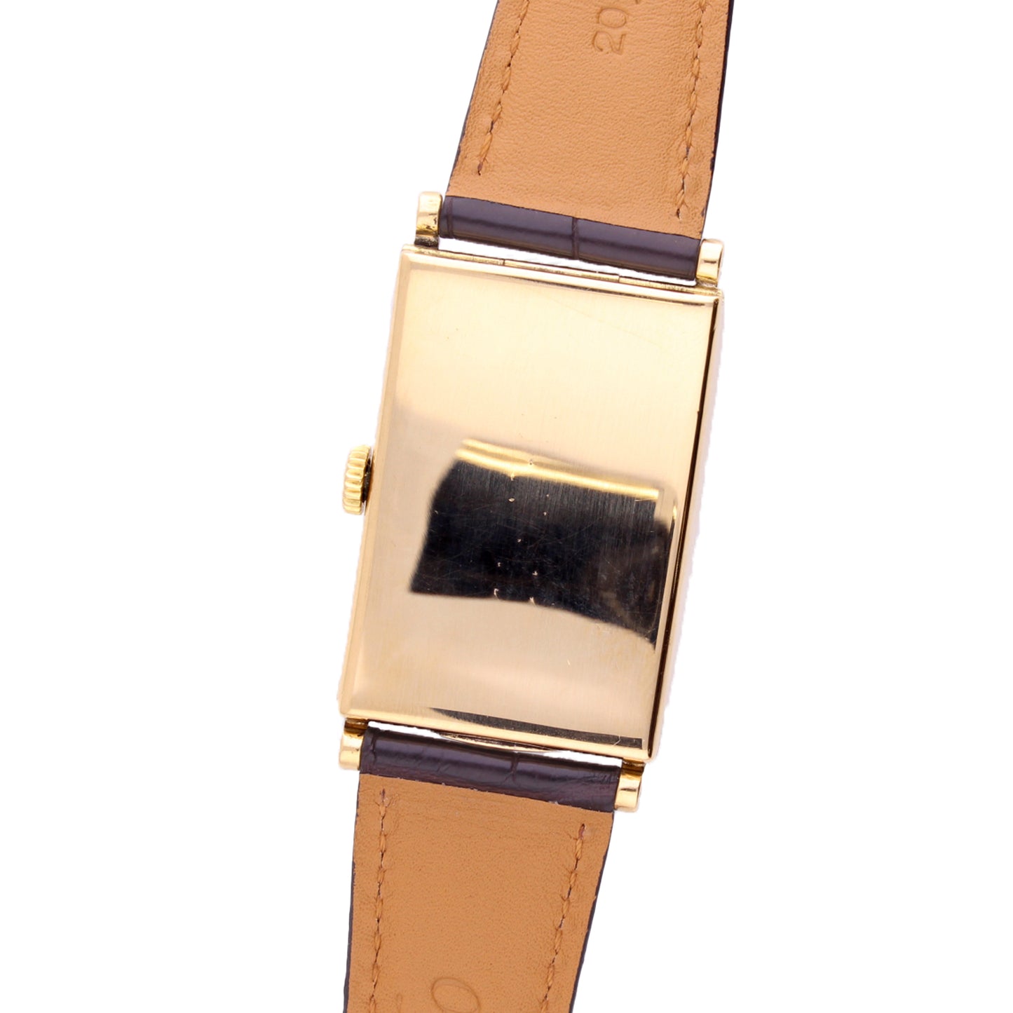 18ct yellow gold Patek Philippe, ref. 431 rectangular curved wristwatch, retailed by TIFFANY. Made 1940
