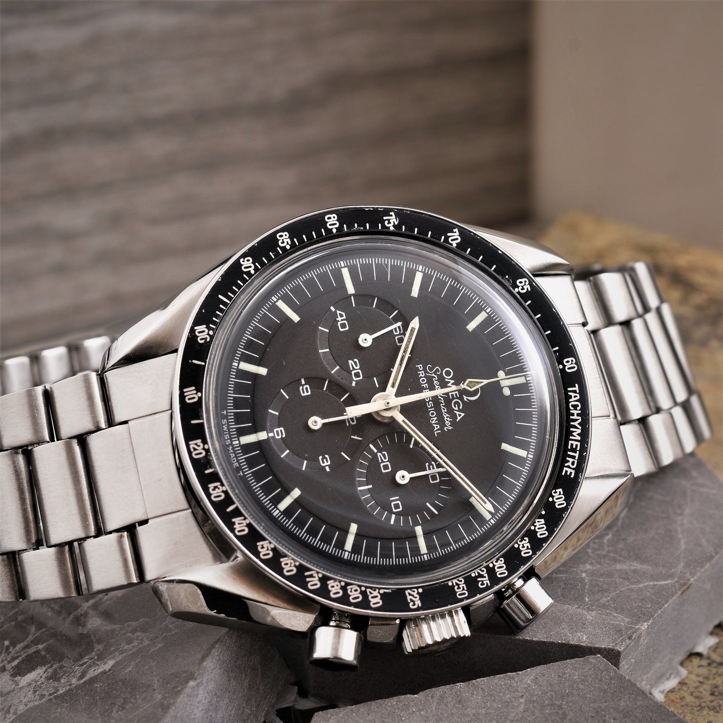 Stainless steel OMEGA ref. 145.022 Speedmaster 'Straight case writing' Professional chronograph wristwatch. Made 1971