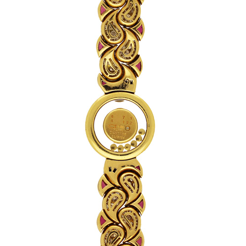 18ct yellow gold Chopard, ruby and diamond set 'Happy Diamonds' bracelet watch. Made 1980