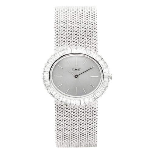 18ct white gold Piaget ref. 9322 'oval cased' and diamond set bezel bracelet watch. Made 1970s