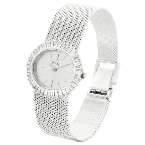 18ct white gold Piaget ref. 9322 'oval cased' and diamond set bezel bracelet watch. Made 1970s