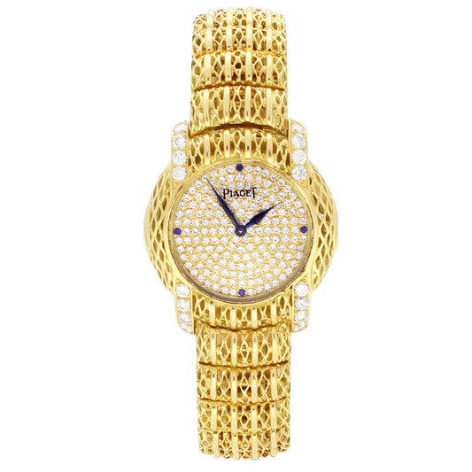 18ct yellow gold 'round cased' Piaget ref. 8055 bracelet watch with diamond set dial and diamond set lugs. Made 1980s