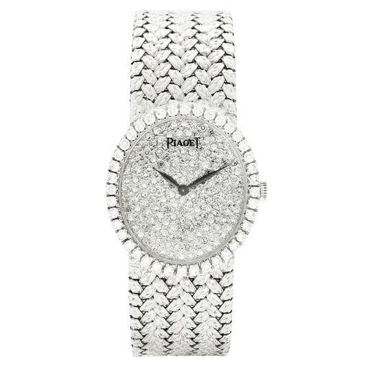 18ct white gold Piaget ref. 9826 oval bracelet watch with diamond set dial and bezel. Made 1970s