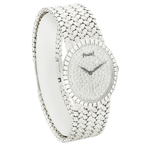 18ct white gold Piaget ref. 9826 oval bracelet watch with diamond set dial and bezel. Made 1970s