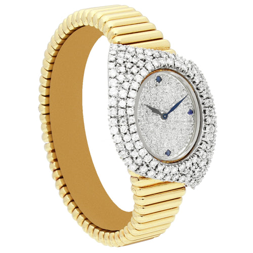 18ct yellow gold Piaget ref. 93331 bracelet watch with pavé diamond set dial and diamond set case. Made 1976