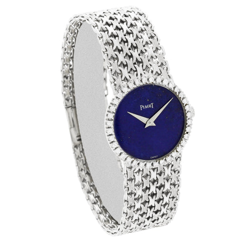 18ct white gold Piaget, 'round cased' bracelet watch with lapis lazuli dial and diamond set bezel. Made 1970's