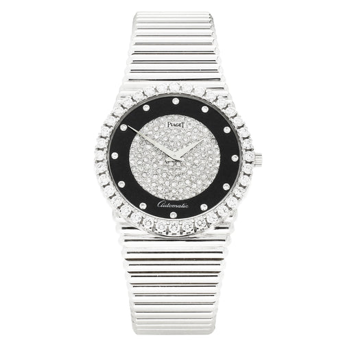 18ct white gold Piaget ref. 12336 bracelet watch with onyx and pavé diamond set dial and diamond set set bezel. Made 1970's