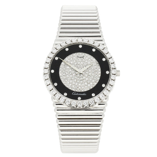 18ct white gold Piaget, reference 12336 bracelet watch with onyx and pavé diamond set dial and diamond set set bezel. Made 1970's