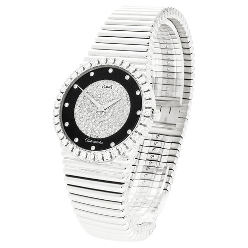 18ct white gold Piaget ref. 12336 bracelet watch with onyx and pavé diamond set dial and diamond set set bezel. Made 1970's