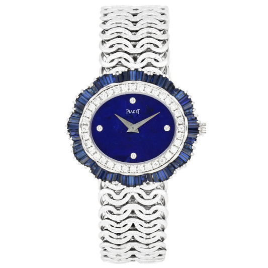18ct white gold Piaget ref. 9317 'oval cased' with lapis lazuli dial and diamond and sapphire set bezel bracelet watch. Made 1970's