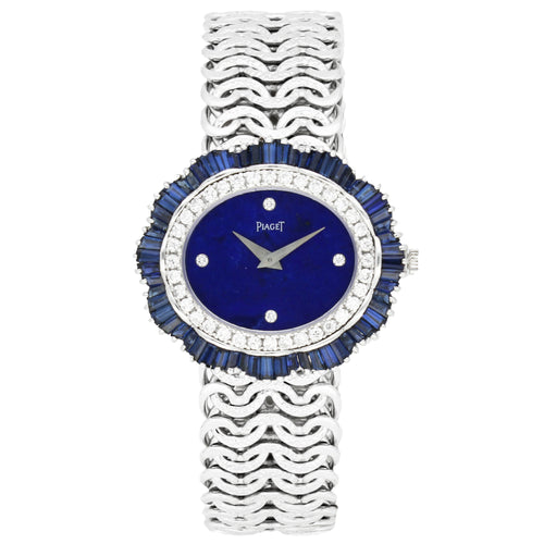 18ct white gold Piaget ref. 9317 'oval cased' with lapis lazuli dial and diamond and sapphire set bezel bracelet watch. Made 1970's