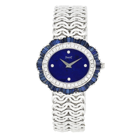 18ct white gold Piaget ref. 9317 'oval cased' with lapis lazuli dial and diamond and sapphire set bezel bracelet watch. Made 1970's