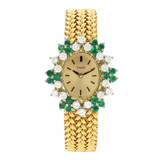 18ct yellow gold Piaget ref. 37712 bracelet watch with diamond and emerald set bezel. Made 1970's