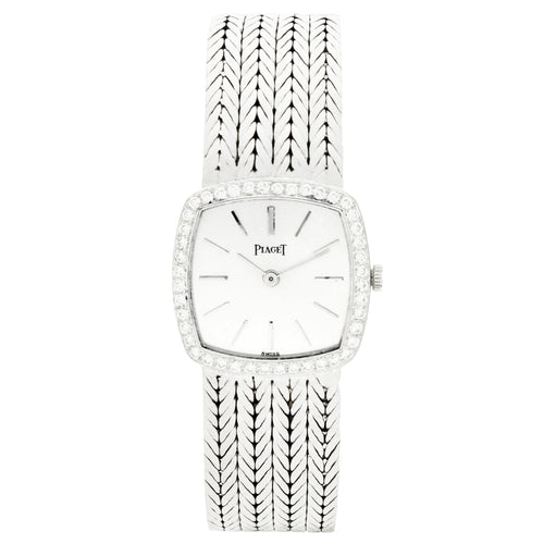 18ct white gold 'cushion cased' Piaget ref. 9235 with silvered dial and diamond set bezel bracelet watch. Made 1970's