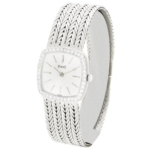 18ct white gold 'cushion cased' Piaget ref. 9235 with silvered dial and diamond set bezel bracelet watch. Made 1970's