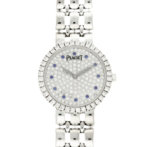 18ct white gold 'round cased' Piaget, with diamond set dial and bezel bracelet watch. Made 1970s