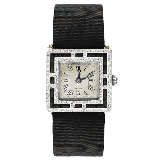 Platinum Cartier onyx and diamond set cocktail watch. Circa 1920