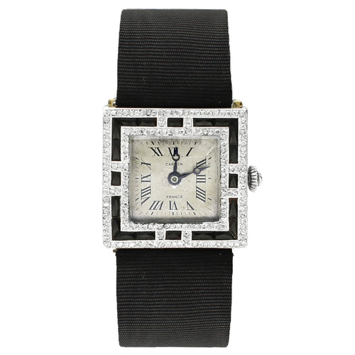 Platinum Cartier onyx and diamond set cocktail watch. Made 1920's