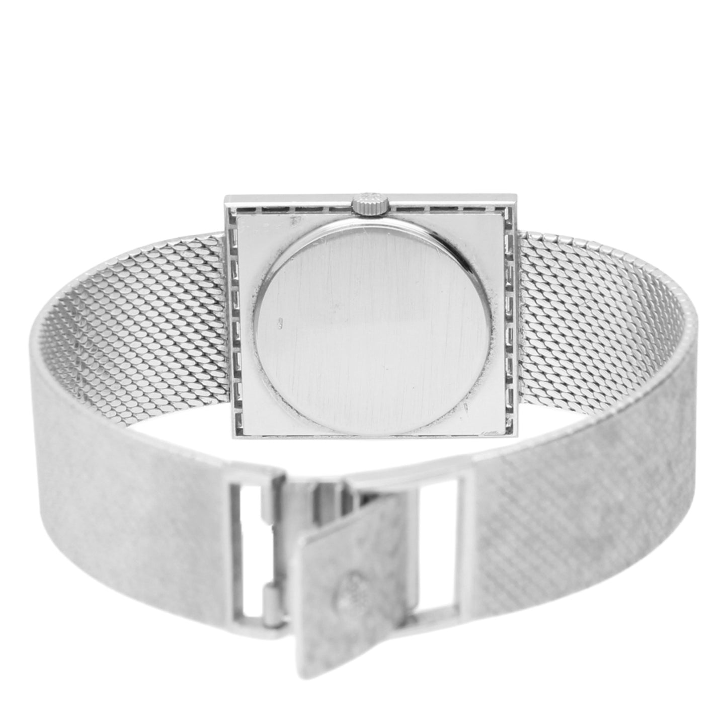 18ct white gold Patek Philippe ref. 3540/2 bracelet watch with baguette diamond set bezel retailed by GÜBELIN. Made 1975