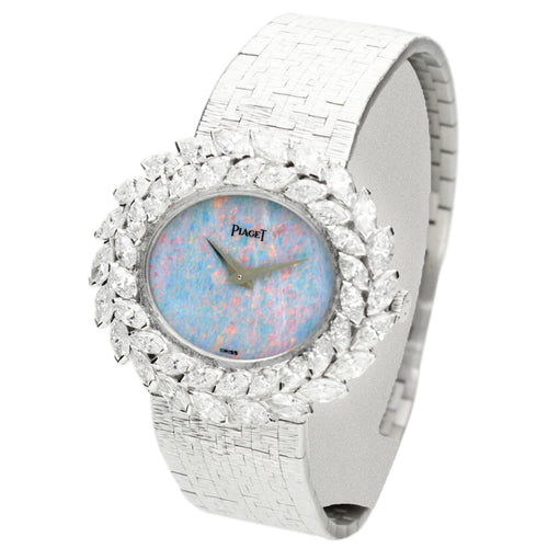 18ct white gold and diamond set Piaget ref. 9385 bracelet watch with opal dial. Made 1972