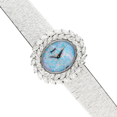 18ct white gold and diamond set Piaget ref. 9385 bracelet watch with opal dial. Made 1972