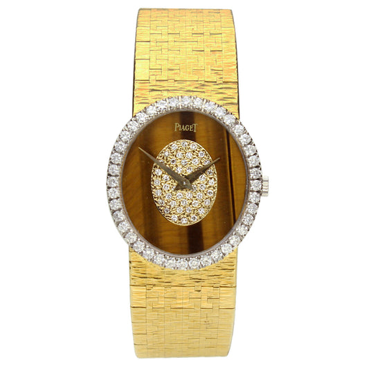 18ct yellow gold Piaget, reference  9826 bracelet watch with tigers eye/diamond set dial and diamond set bezel. Made 1970's