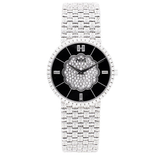 18ct white gold Piaget ref. 9066 bracelet watch with onyx dial and diamond set bezel. Made 1989