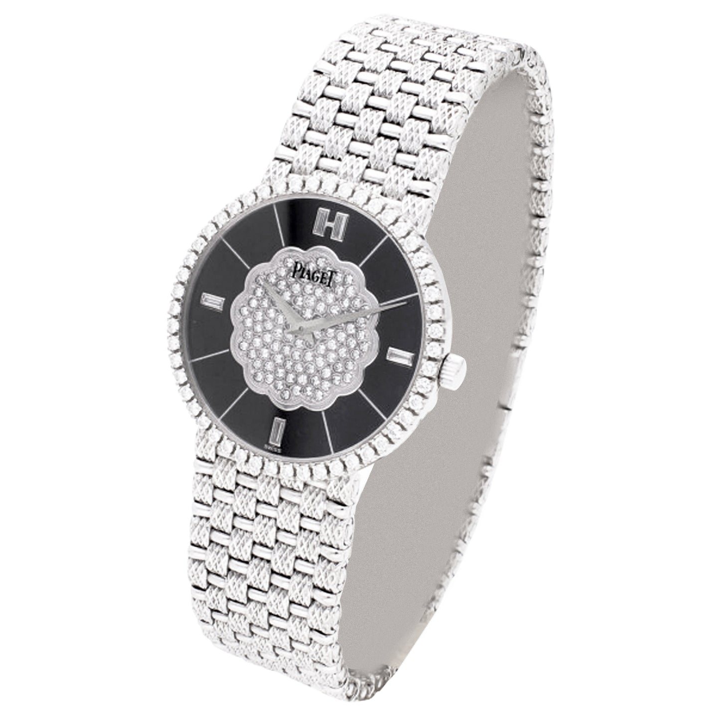 18ct white gold Piaget ref. 9066 bracelet watch with onyx dial and diamond set bezel. Made 1989