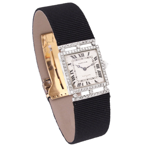 Platinum and dismond set Cartier wristwatch. Made 1920's