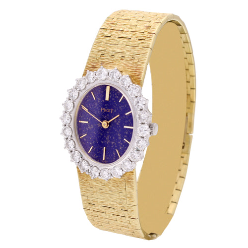 18ct yellow gold Piaget ref. 9338 bracelet watch with lapis lazuli dial and diamond set bezel. Made 1970's