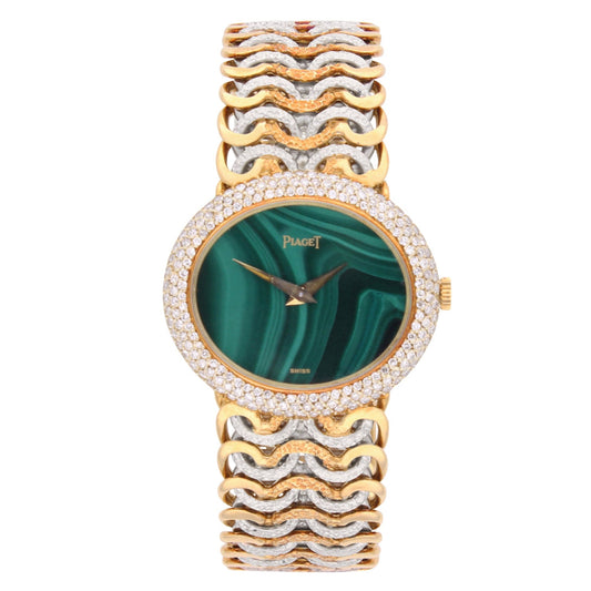 Tri-gold Piaget ref. 98125 'oval cased' bracelet watch with malachite dial and diamond set bezel. Made 1970's