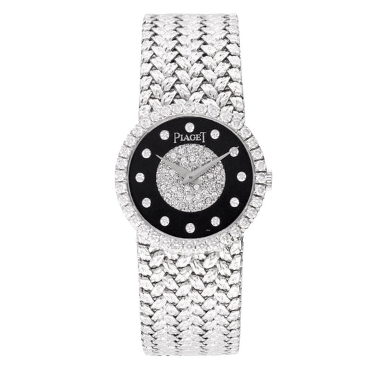18ct white gold Piaget bracelet watch with onyx & diamond set dial. Made 1970