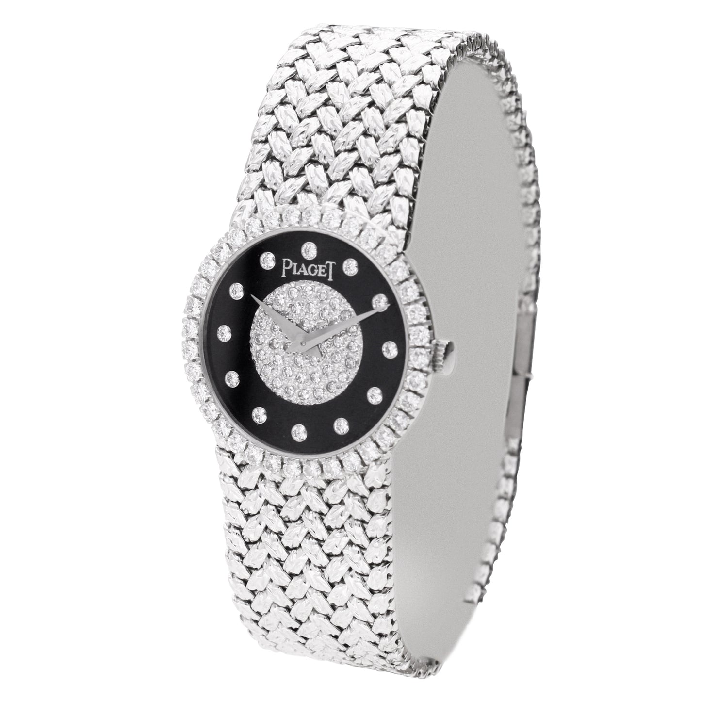 18ct white gold Piaget bracelet watch with onyx & diamond set dial. Made 1970