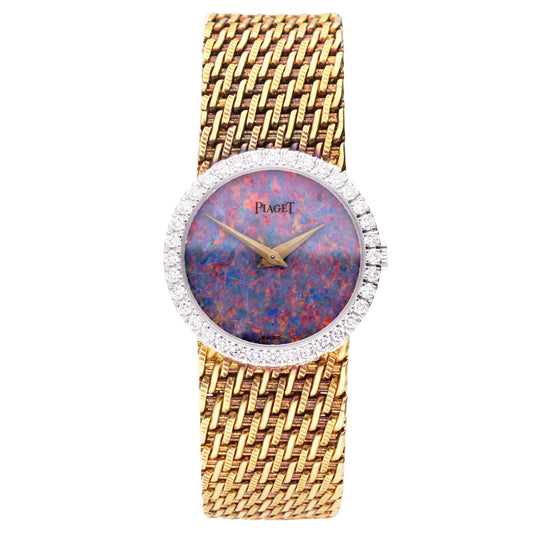 18ct yellow gold Piaget ref. 9706 bracelet watch with an opal dial & diamond set bezel. Made 1970