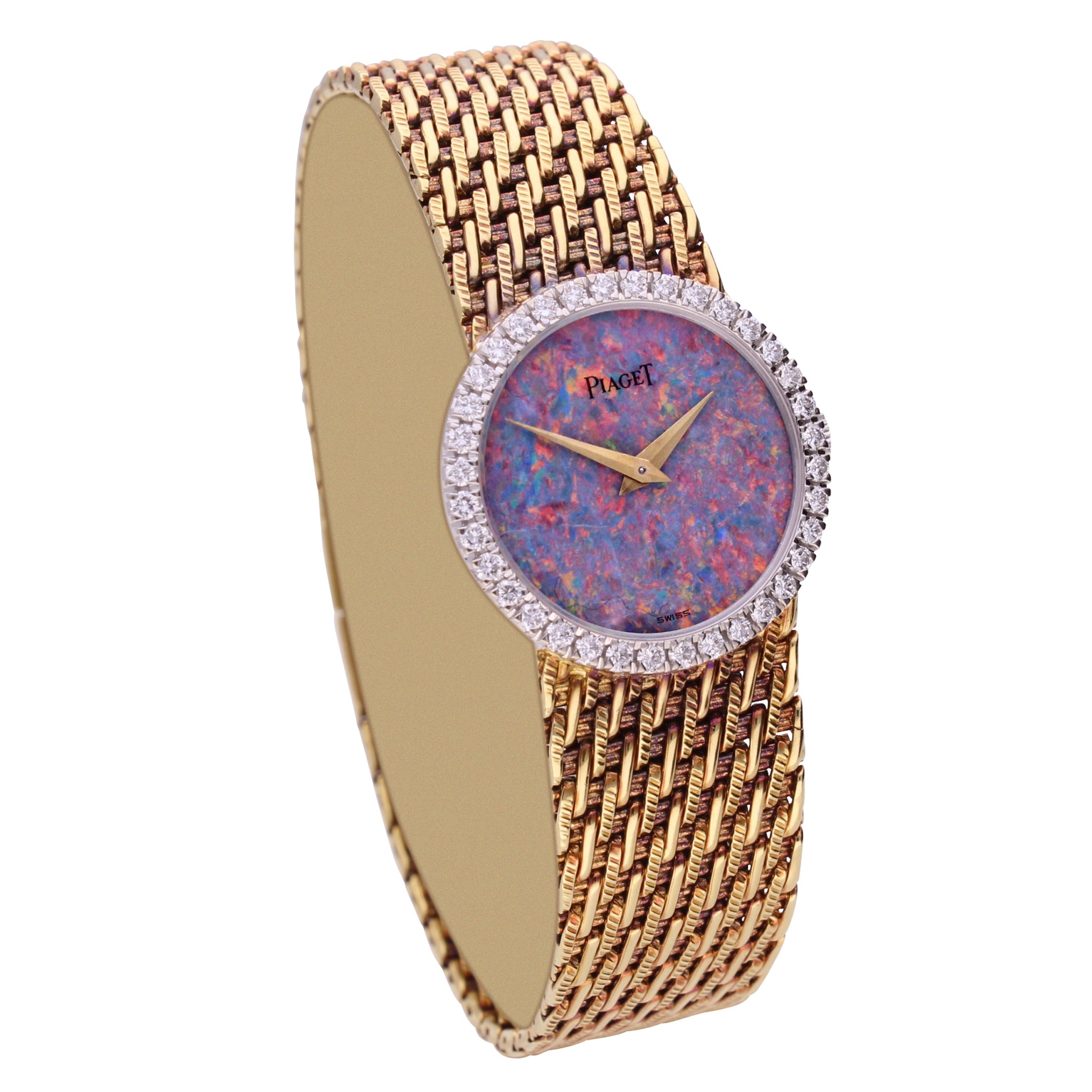 18ct yellow gold Piaget bracelet watch with an opal dial diamond