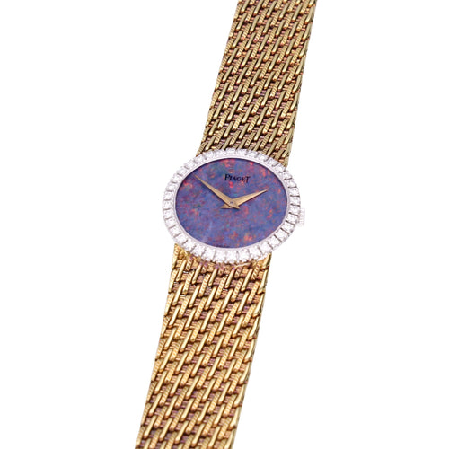 18ct yellow gold Piaget ref. 9706 bracelet watch with an opal dial & diamond set bezel. Made 1970